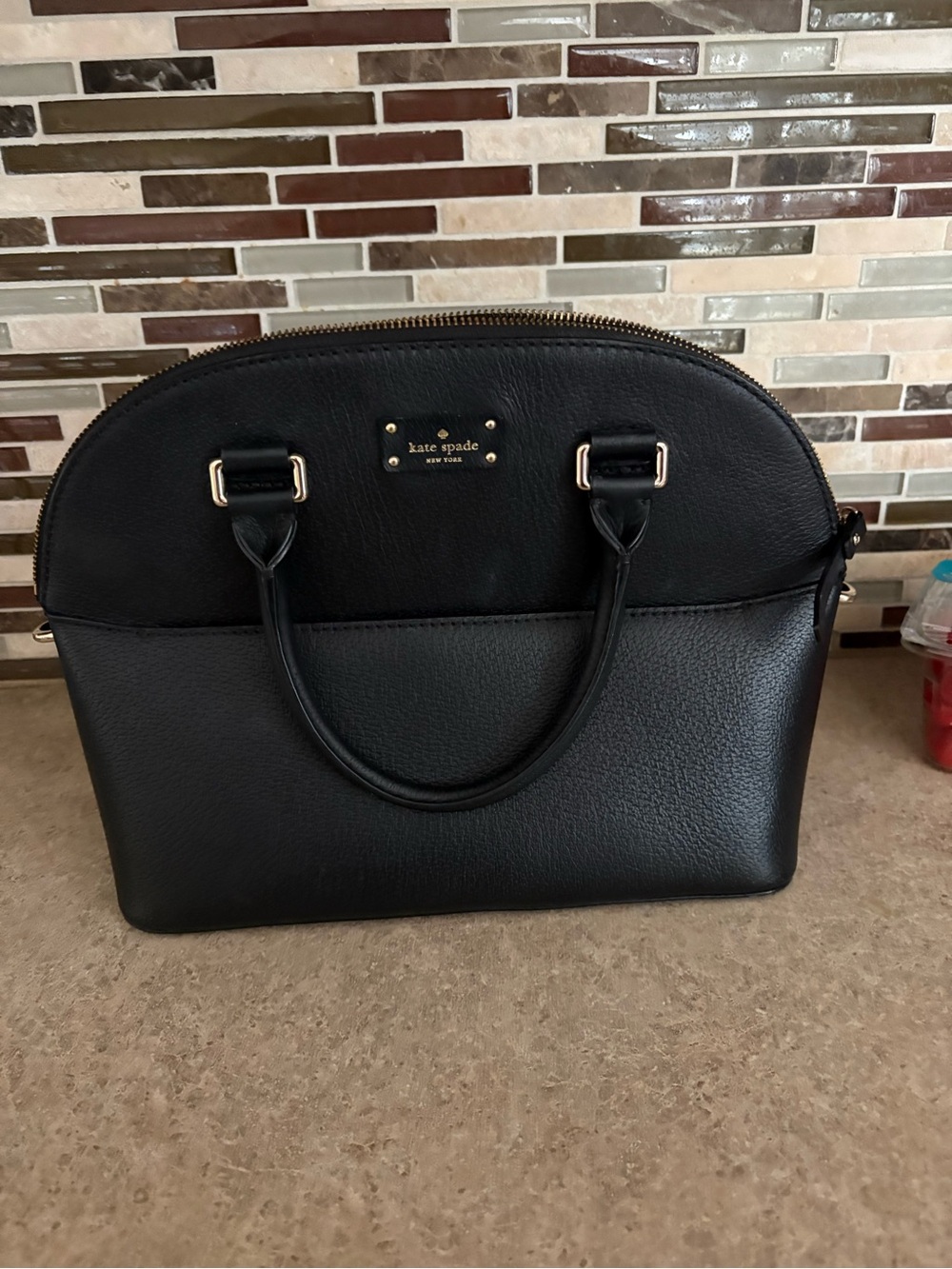 kate spade black leather dome satchel with gold hardware